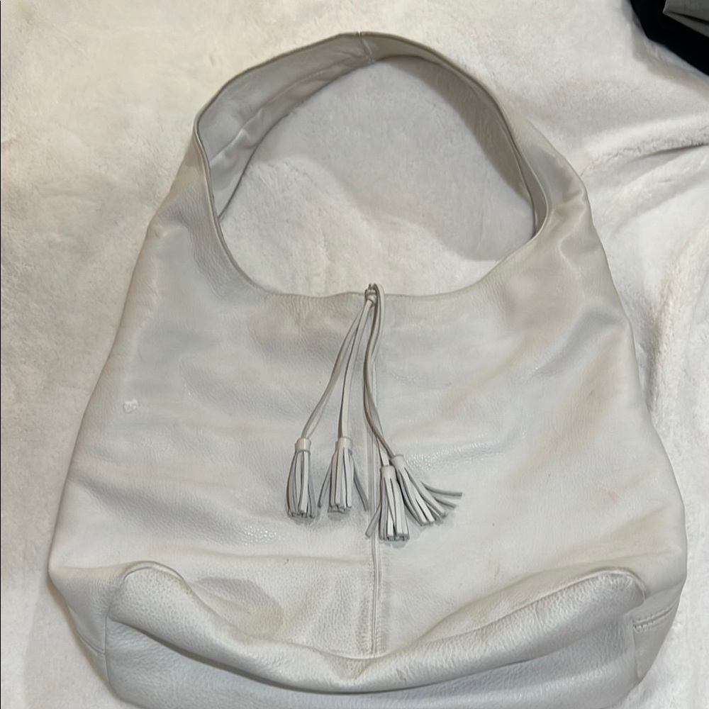 Chic White Hobo Bag with Tassel Details